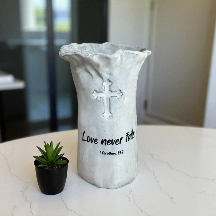 Love never fails.