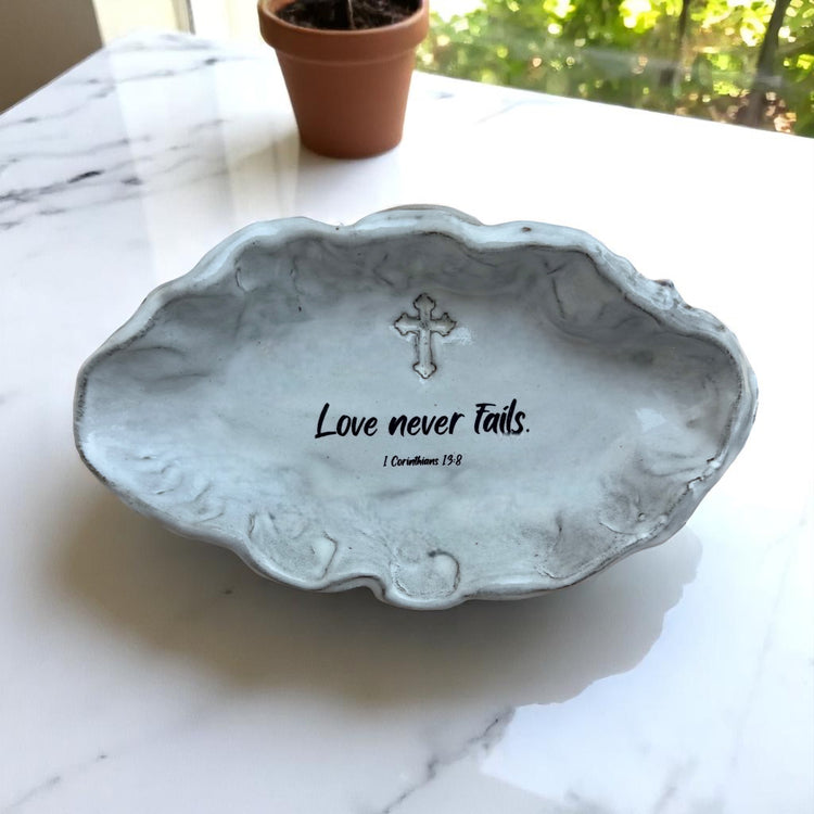Love never fails.